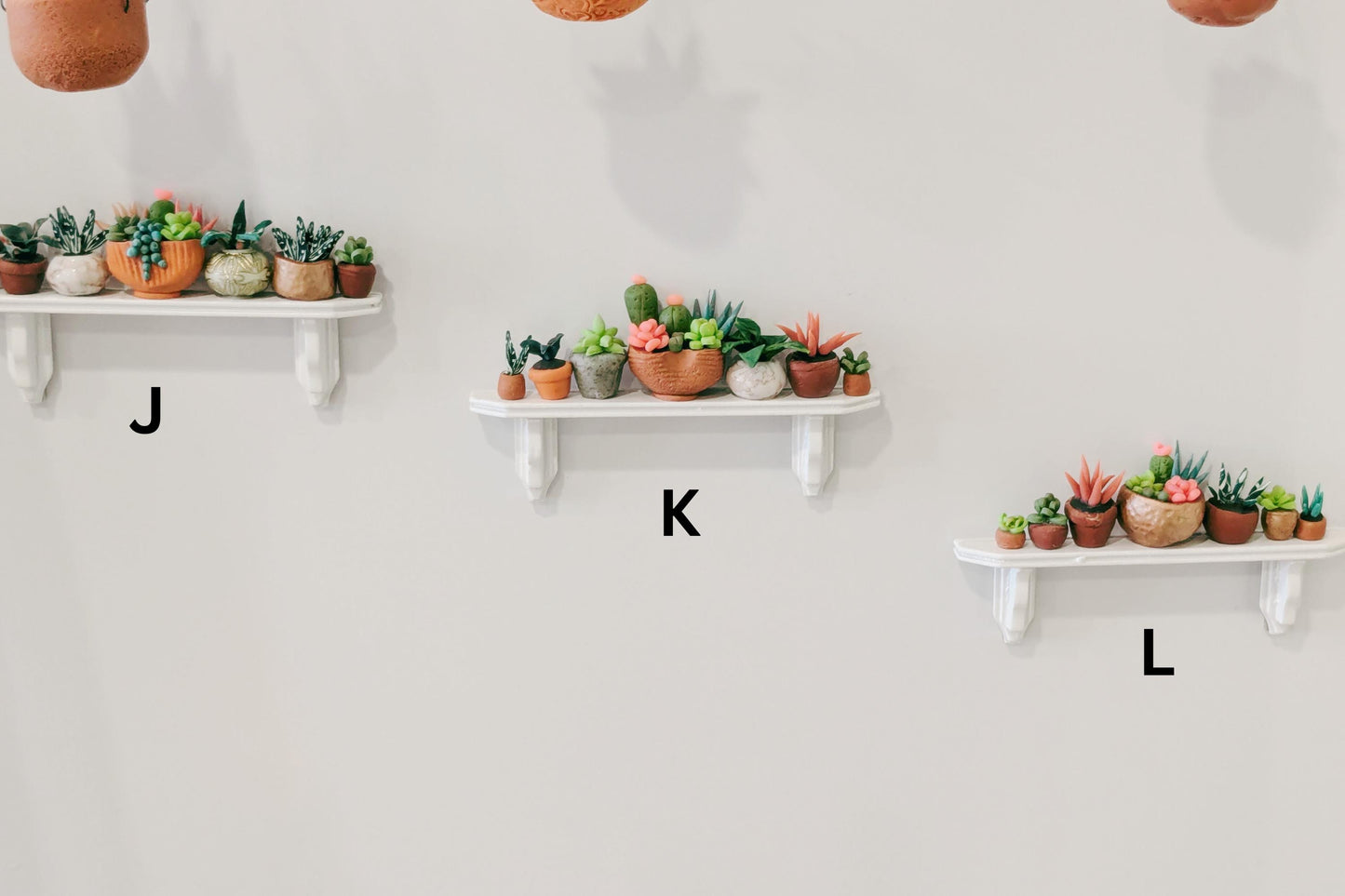 One of a kind shelf plant magnets